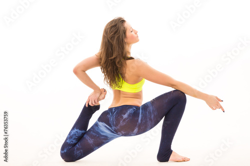 young woman doing stretching from the hip