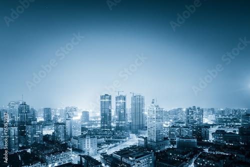 night shanghai skyline with reflection  beautiful modern city