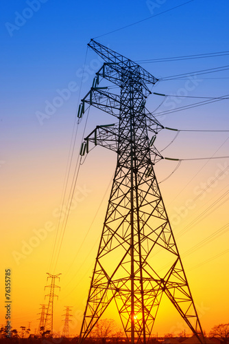 high voltage post.High-voltage tower sky background. © snvv