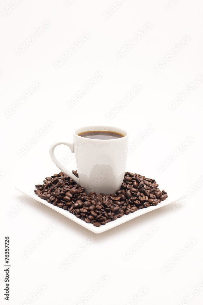 Brown coffee beans isolated on white background Brown coffee beans isolated on white background