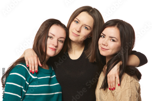 three girlfriends on a white background