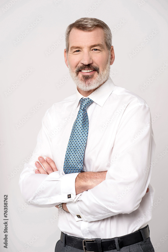 Successful businessman with folded arms Successful businessman with folded arms