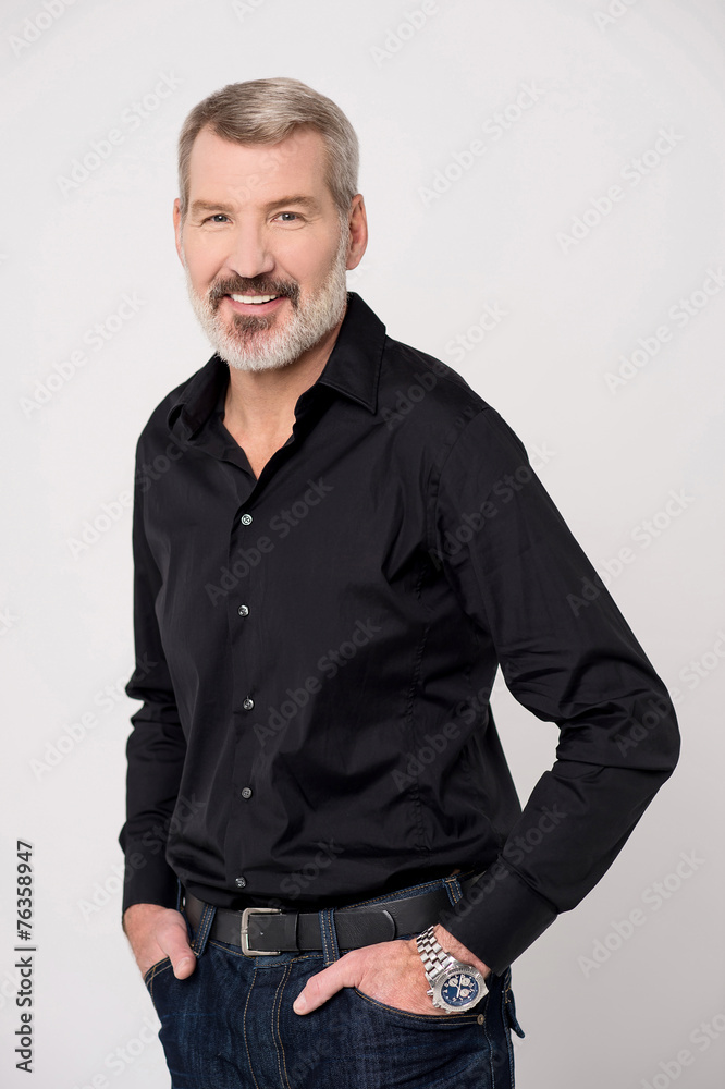 Senior man posing casually Senior man posing casually