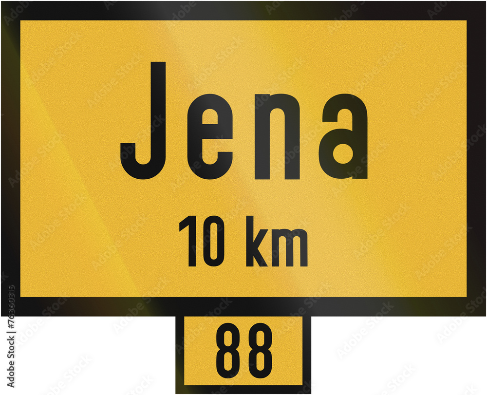 Old design (1956) of a sign telling the distance to the city of Jena on the federal road number 88. The text means: To Jena 10 km Old design (1956) of a sign telling the distance to the city of Jena on the federal road number 88. The text means: To Jena 10 km