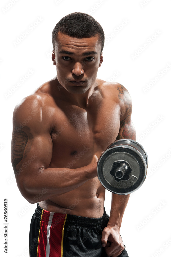 Young African sportsman exercising dumbbell