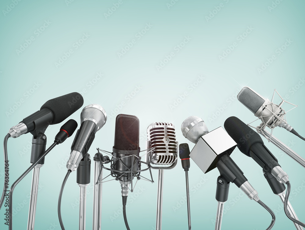 Various microphones aligned at press conference. - obrazy, fototapety, plakaty 