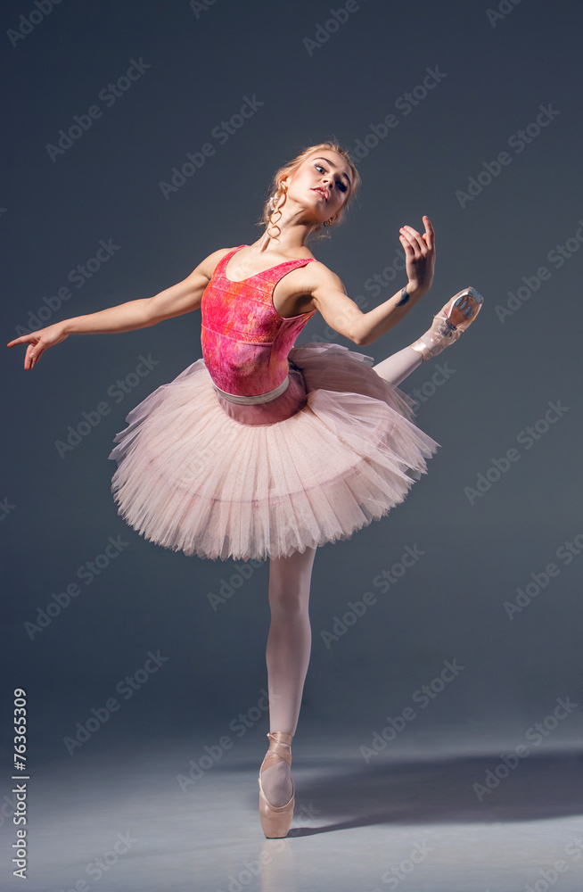 Naklejka premium Portrait of the ballerina in ballet pose