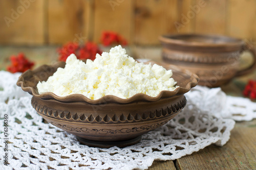 Cottage Cheese and milk in a clay pot