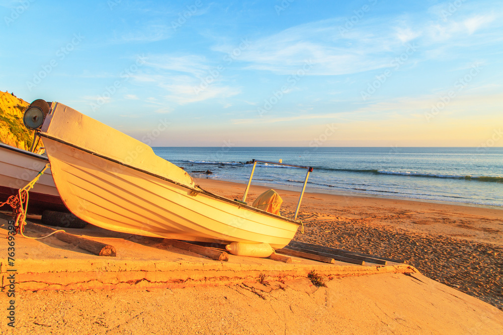 Boats in warm sunset light on the Fisherman's Beach in Albufeira Boats in warm sunset light on the Fisherman's Beach in Albufeira