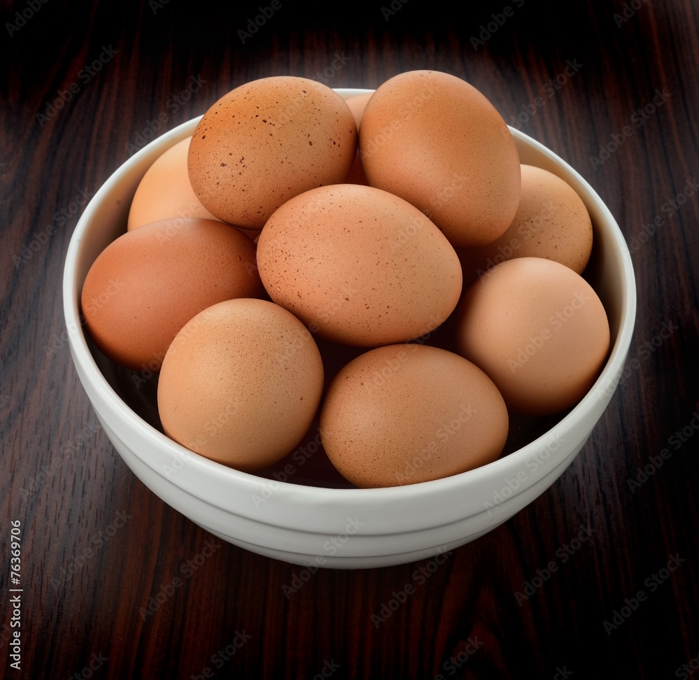 eggs in the bowl isolate on white eggs in the bowl isolate on white