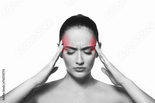 Woman suffering from the head ache