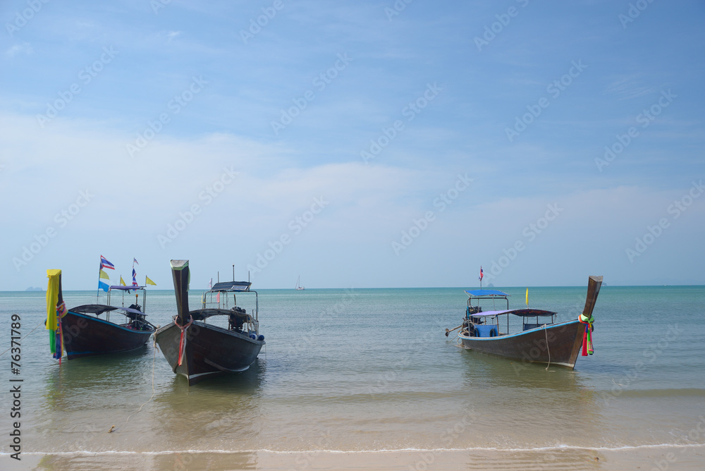 Obraz premium Three wooden boats