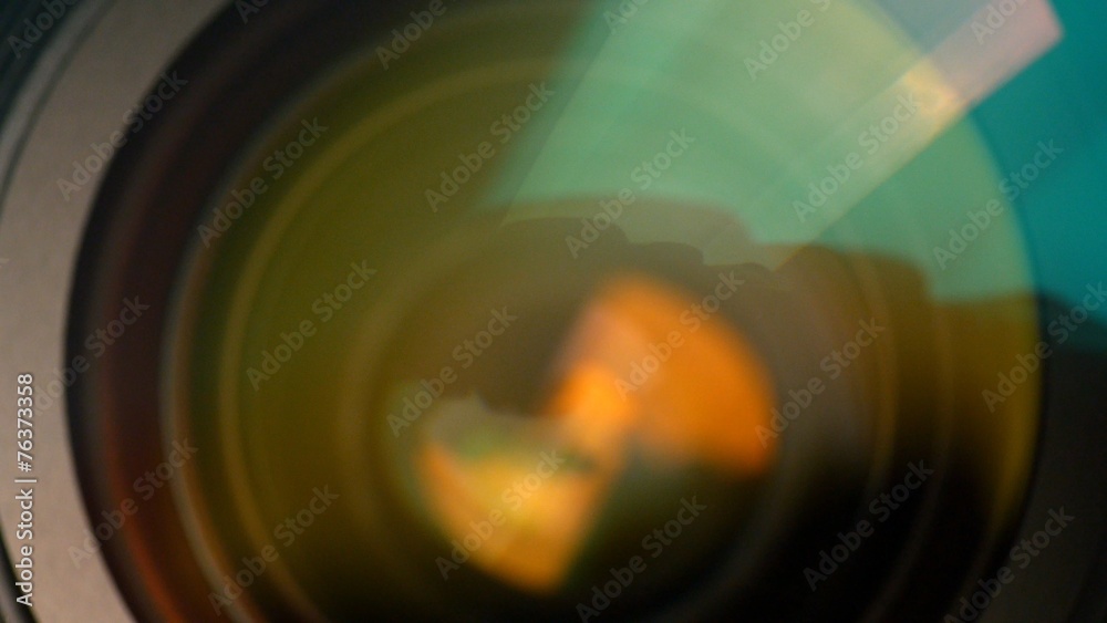 Closeup of a zooming camera lens. Ultra HD