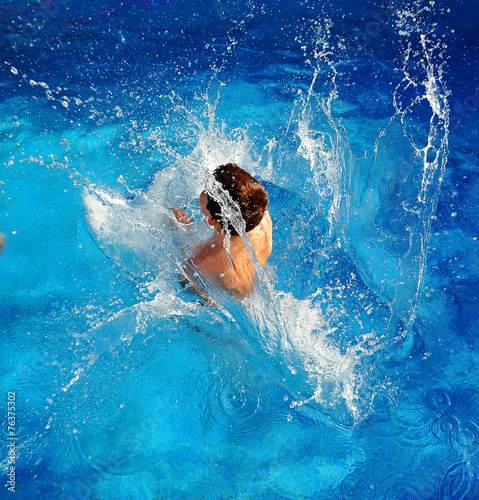 Photos Child in swimming pool, summer vacation