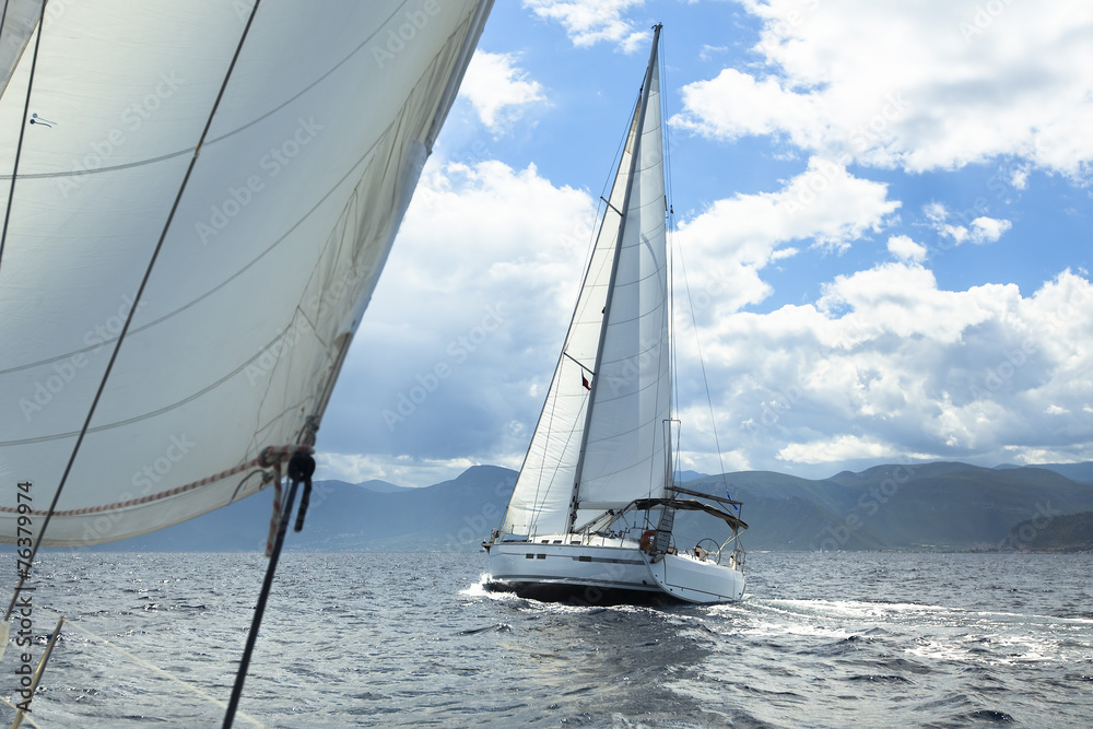 Naklejka premium Sailing regatta in inclement weather. Sailboats. Yachting.