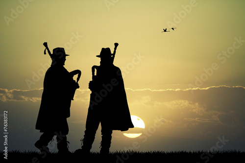 pipers at sunset