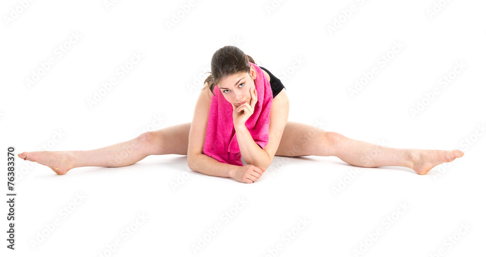 Young woman warming up for a gymnastics exercise Young woman warming up for a gymnastics exercise