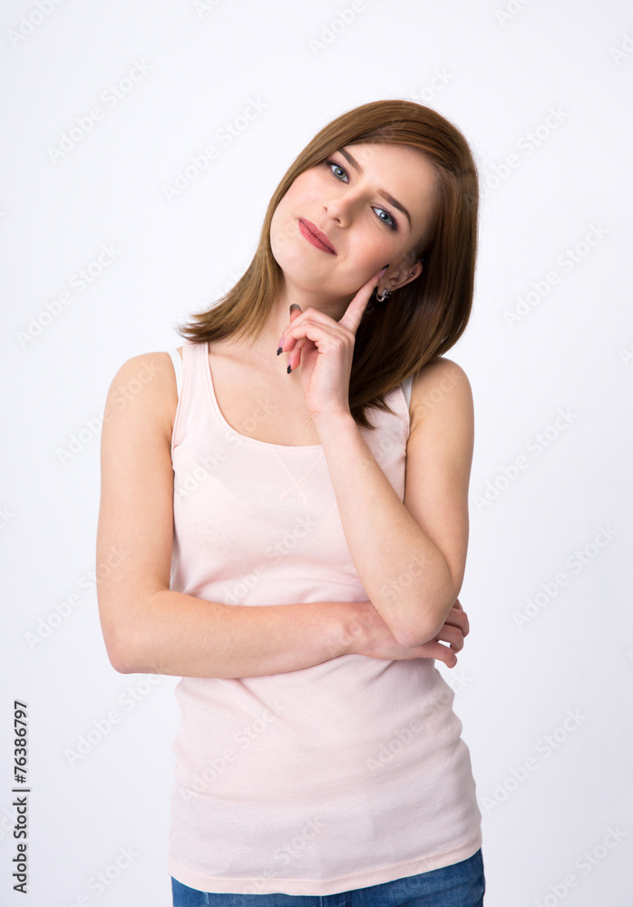 Portrait of ahappy cute woman standing over gray background Portrait of ahappy cute woman standing over gray background
