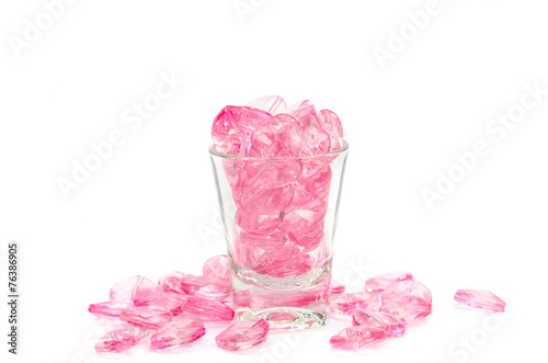 pink hearts glass on white background