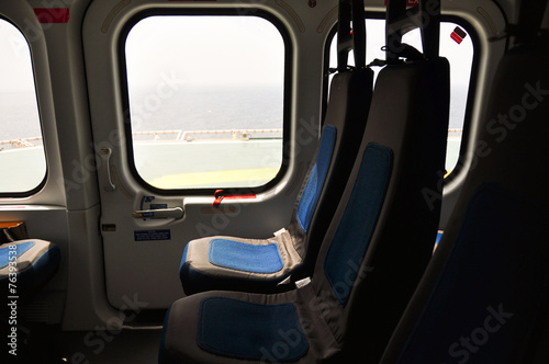 Helicopter interior and seat for passenger