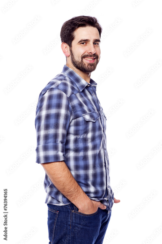 Fototapeta premium Portrait of young casual man smiling, isolated on white backgrou