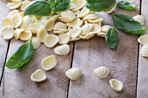 Orecchiette pasta dry raw on the table