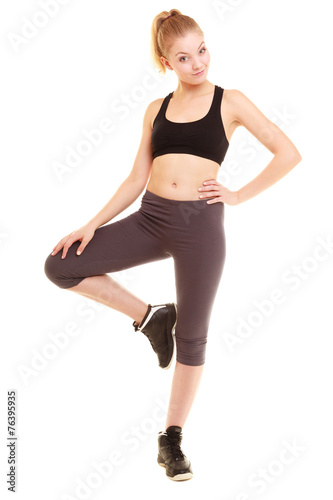 sport. fitness sporty blonde girl stretching leg isolated