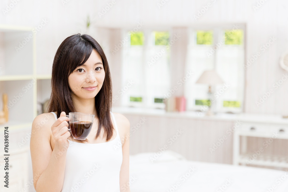 young asian woman relaxing in the bed room young asian woman relaxing in the bed room