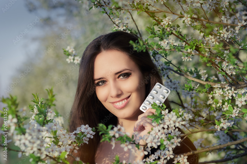 Woman with Allergy Holding Anti Allergic Pills in Spring Decor Woman with Allergy Holding Anti Allergic Pills in Spring Decor