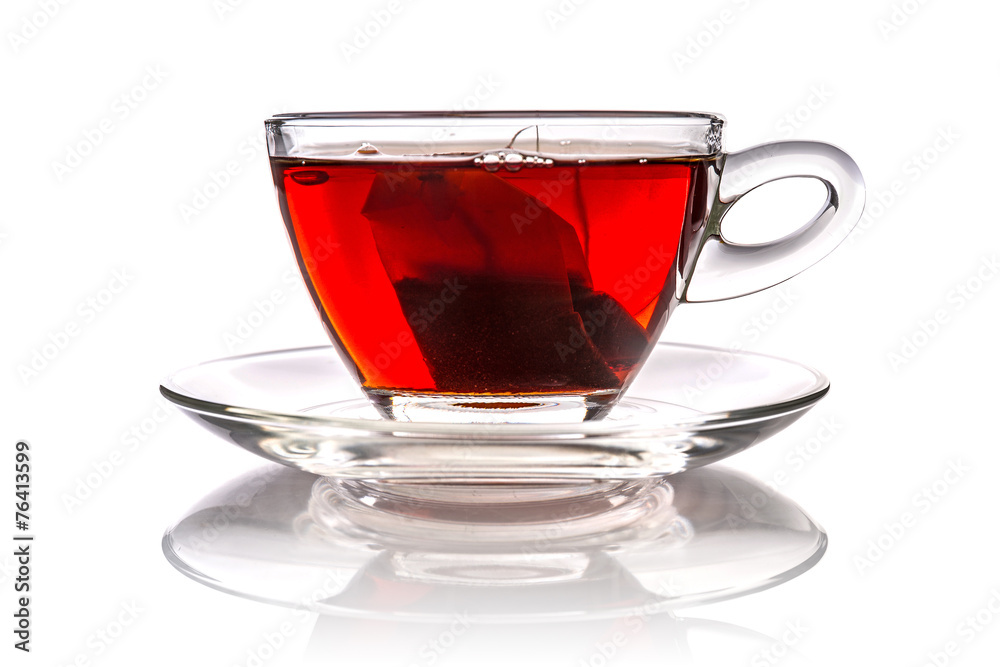 Cup of tea with teabag over white Cup of tea with teabag over white