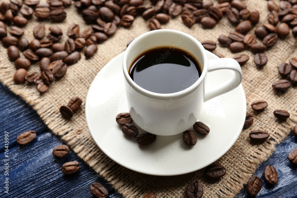 Cup of coffee on wooden table Cup of coffee on wooden table