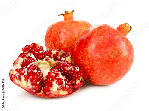 Juicy ripe pomegranates, isolated on white