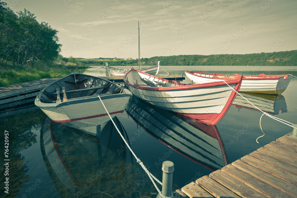 Floating Wooden Boat with Paddles