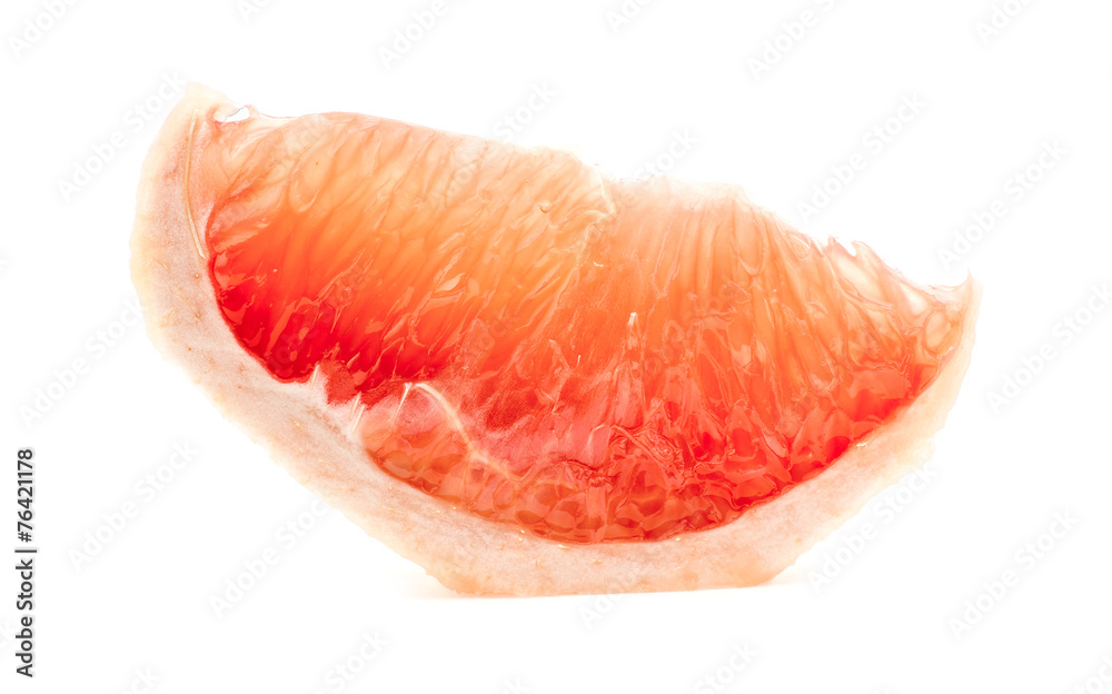 Delicious slice of grapefruit isolated on white Delicious slice of grapefruit isolated on white