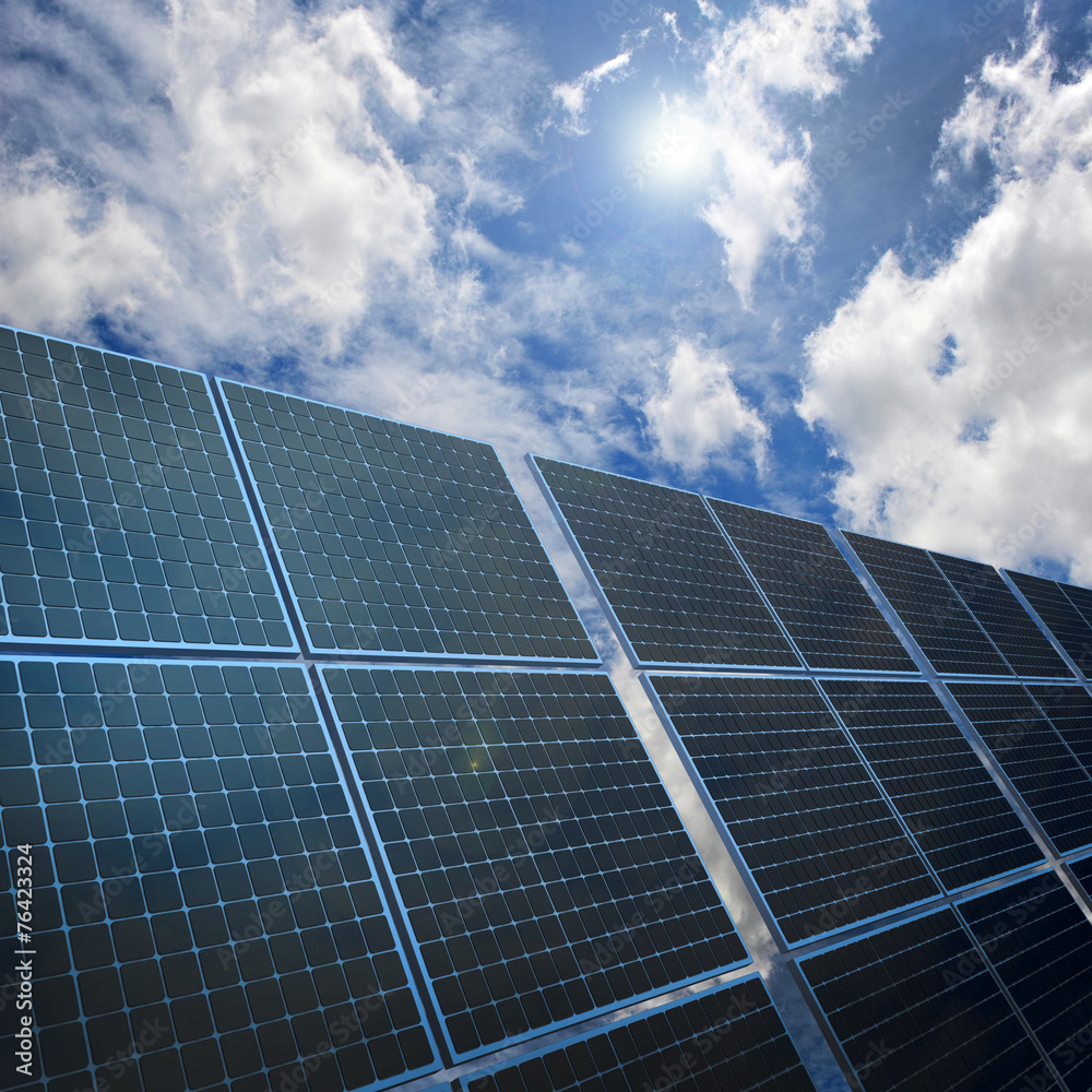 Solar energy panels on nice sky background with white clouds Solar energy panels on nice sky background with white clouds