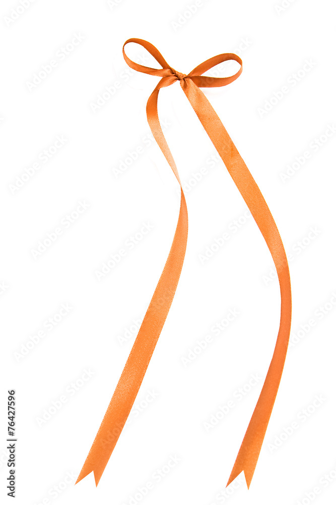 Fabric orange ribbons and bows. Isolated on white background Fabric orange ribbons and bows. Isolated on white background