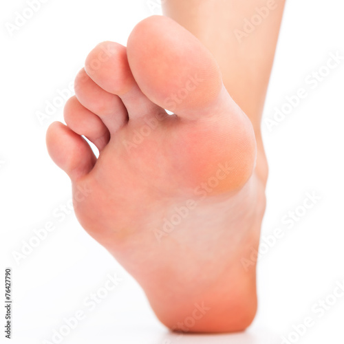 Foot stepping on white