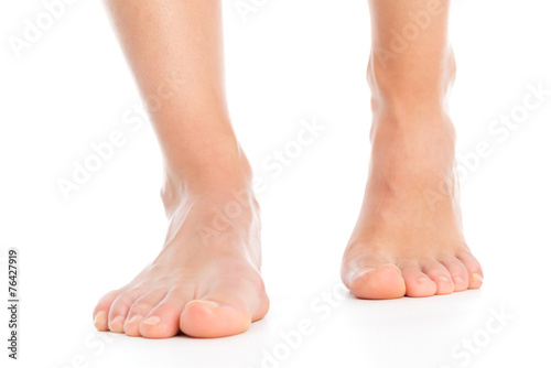 Woman legs isolated foot stepping © koszivu