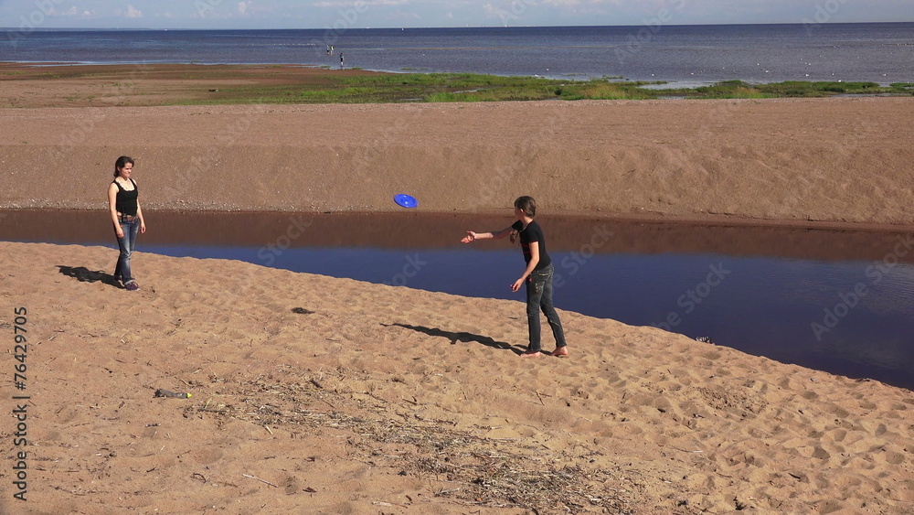 Mother with daughter play with flying saucer. 4K. Mother with daughter play with flying saucer. 4K.