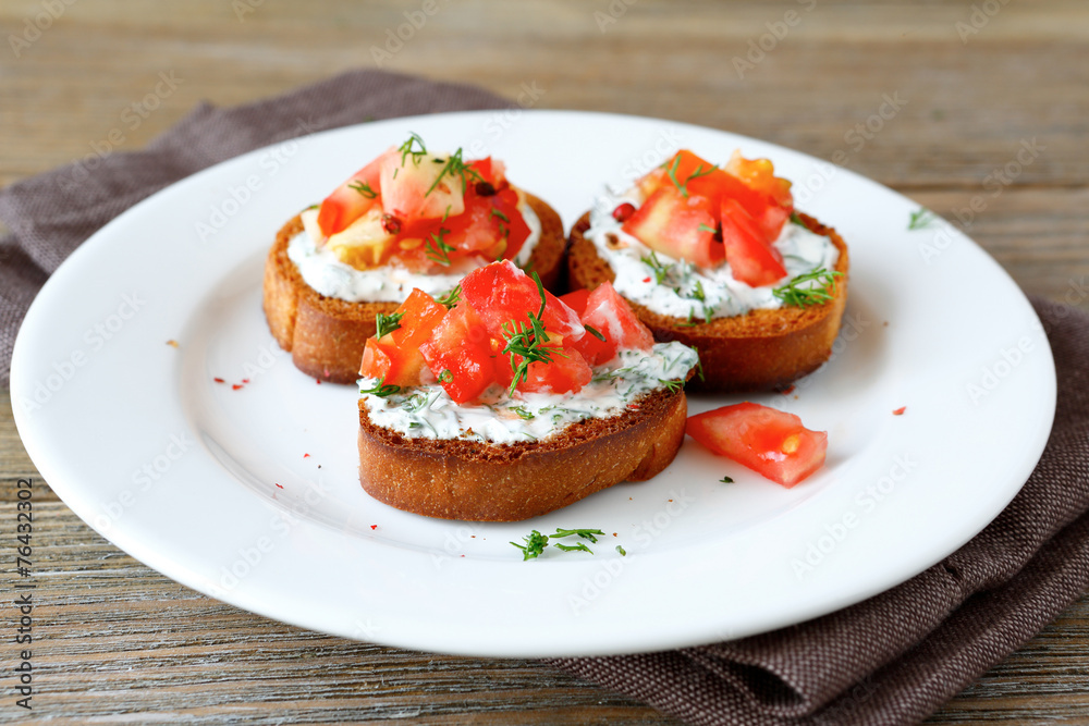 Bruschetta with tomato and cheese Bruschetta with tomato and cheese