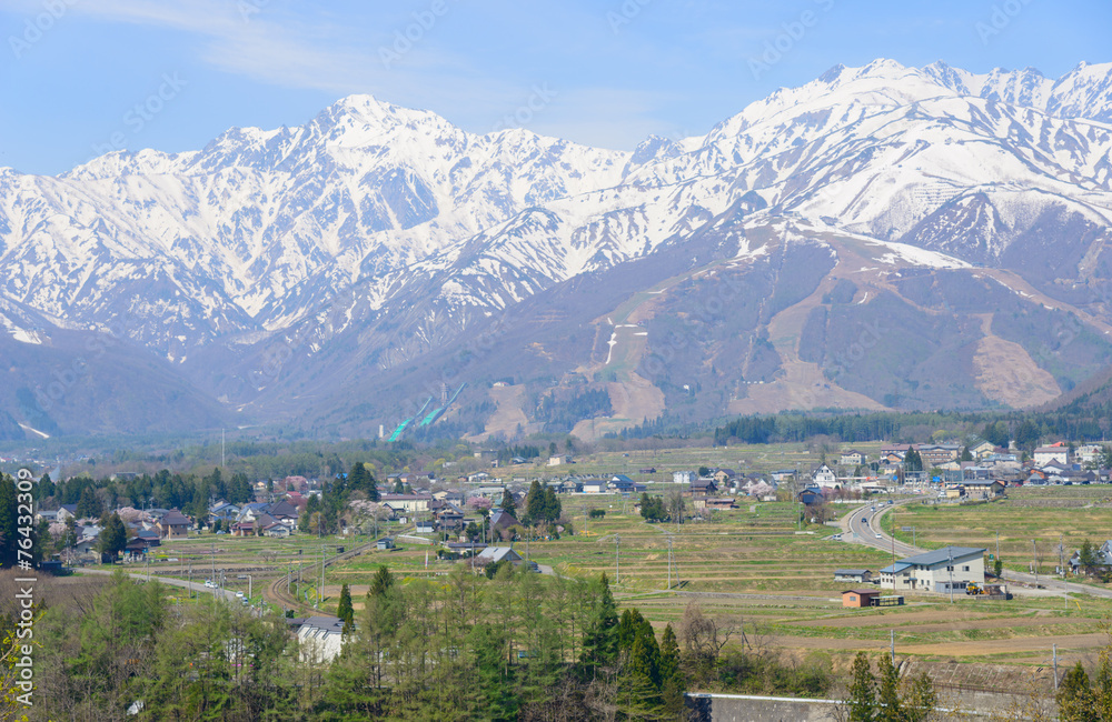 Landscape of the village of Hakuba and Shirouma mountains in Nag