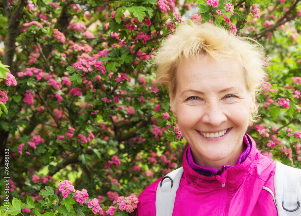 Portrait of the sports woman of average years at a blossoming h Portrait of the sports woman of average years at a blossoming h