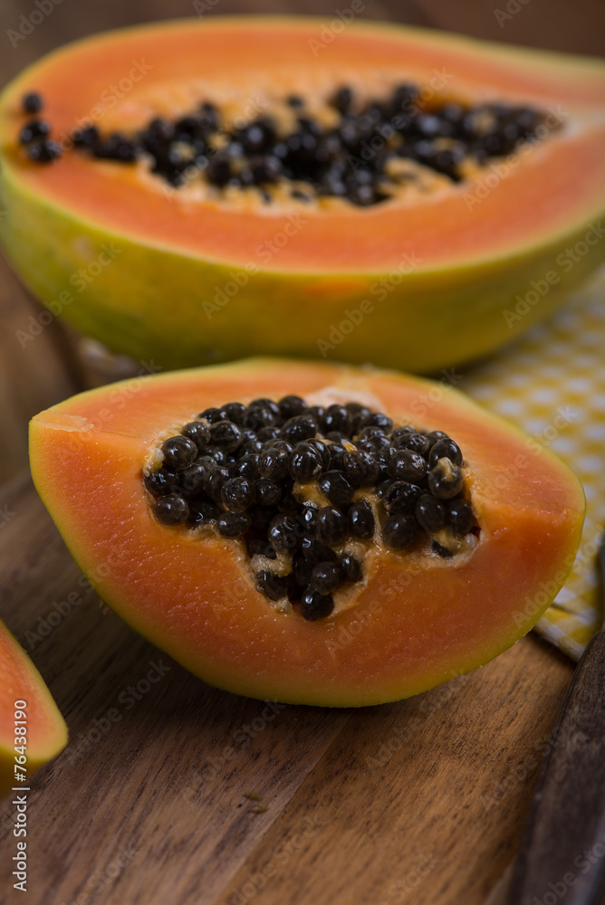 Papaya fruit cut in half Papaya fruit cut in half
