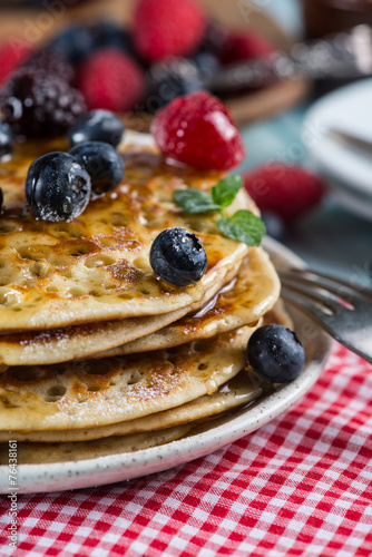 Delicious homemade pancakes breakfast with fresh berries fruits