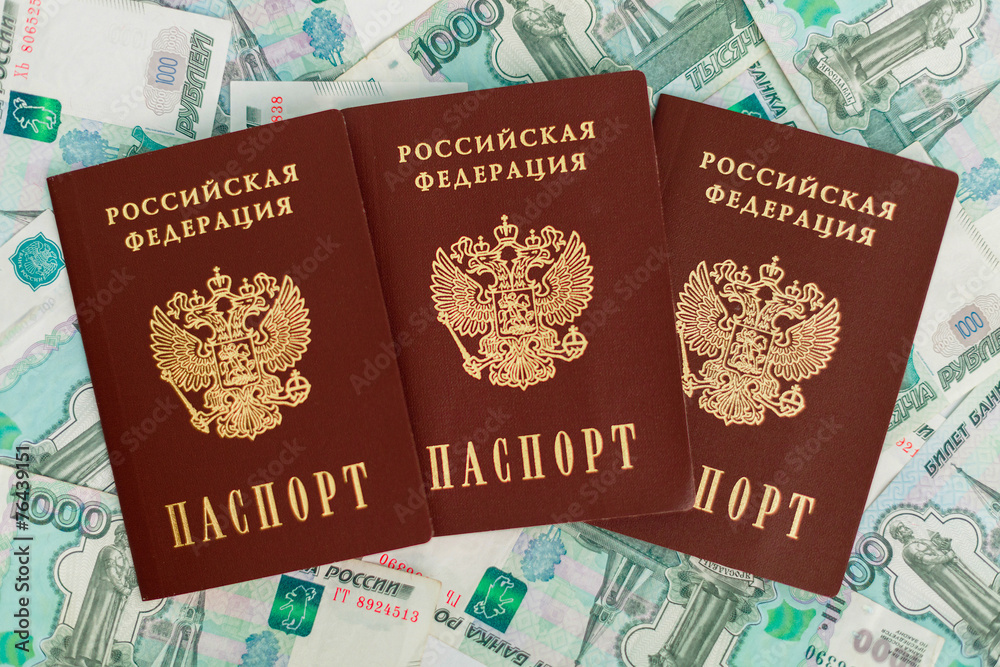 Russian passport on a the background of money
