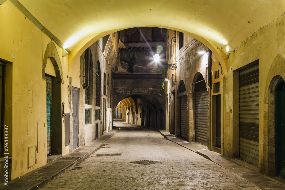 Beautiful narrow street with arch