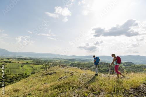 Young couple hiking on the ...