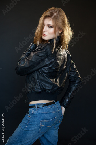 beautiful sensual sexy girl blonde in a leather jacket