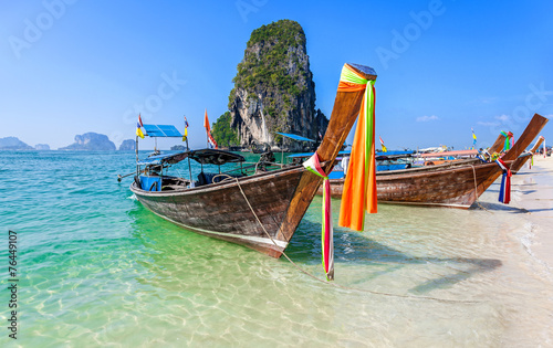 Boats on the Railay beach in Thailand. © MaciejBledowski