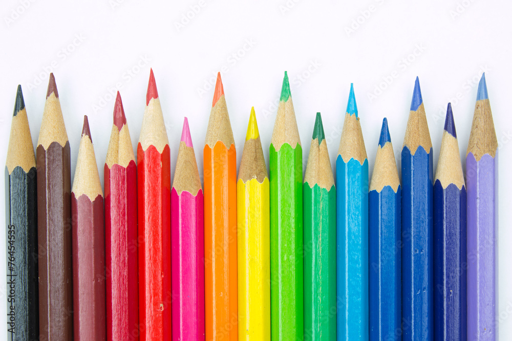 Colored pencils on white background